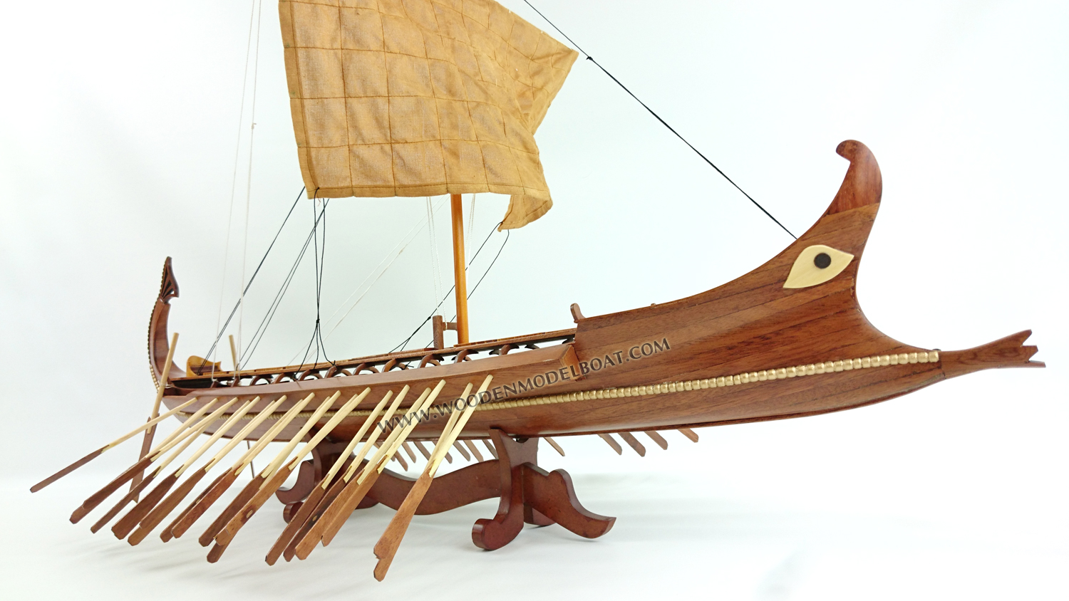 Bireme, ship with two series of oars in each side, was the precursor of trireme and forms the in-between link evolution from pentikoro to subsequent ships. Biremes were made with thirty or fifty oars and the dimensions of these ships are between: 18-22m length, 3-4 m width, 22 tones displacement and the length of the oars 4-6 m. The most famous biremes were made in Samos from tyrant Polykrates and were named samaines. It was a special type of biremes, made in such a way so that could be used as a tanker and as a battle ship in the same time. For greater stability of the ship the Phoenicians lowered the crinolines (platforms where oarsmen sat). A massive bronze covered battering ram was the main weapon of this narrow high speed bireme. The traditional removable rig was typical. A decorative poop extremity of stern was abruptly bent, similarly to a tail of a scorpion, and the balustrade of the battle platform was covered with the shields of warriors for reinforcement. Phoenicians were considered as the best seamen of the time and many ancient states frequently used them as mercenaries.